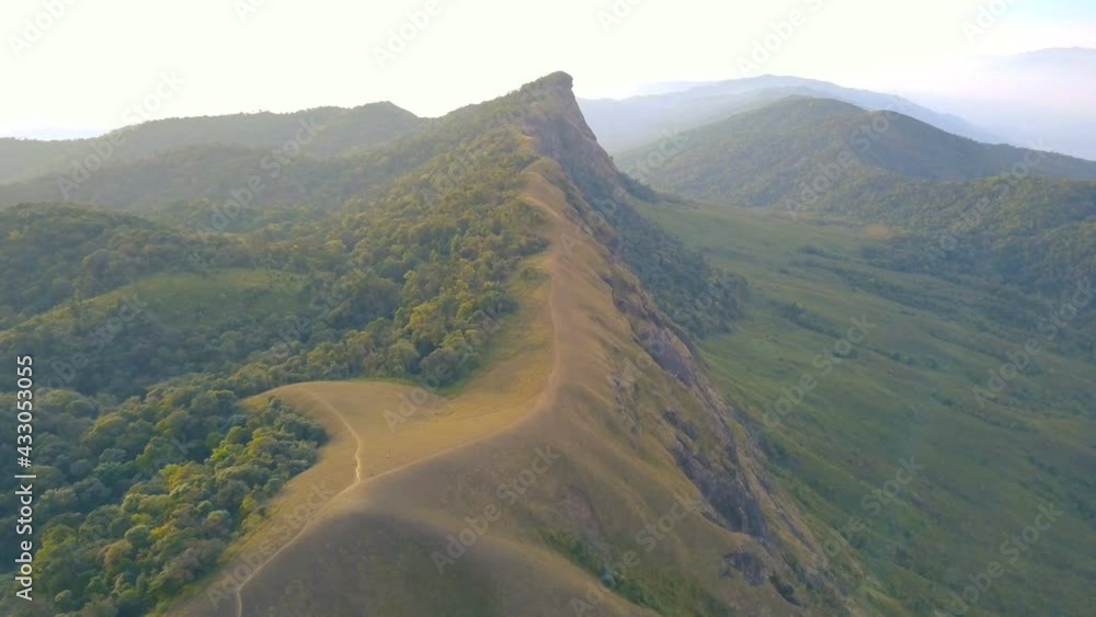 Aerial View. Flying over the high mountains, name Doi Mon Jong with beautiful sunset time in Chiang mai, Thailand. Aerial View. Flying over the high mountains, name Doi Mon Jong with beautiful sunset time in Chiang mai, Thailand.