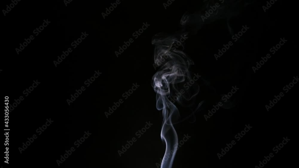 smoke rising by dispersing, steam, fog, smoke rising in the black background smoke rising by dispersing, steam, fog, smoke rising in the black background