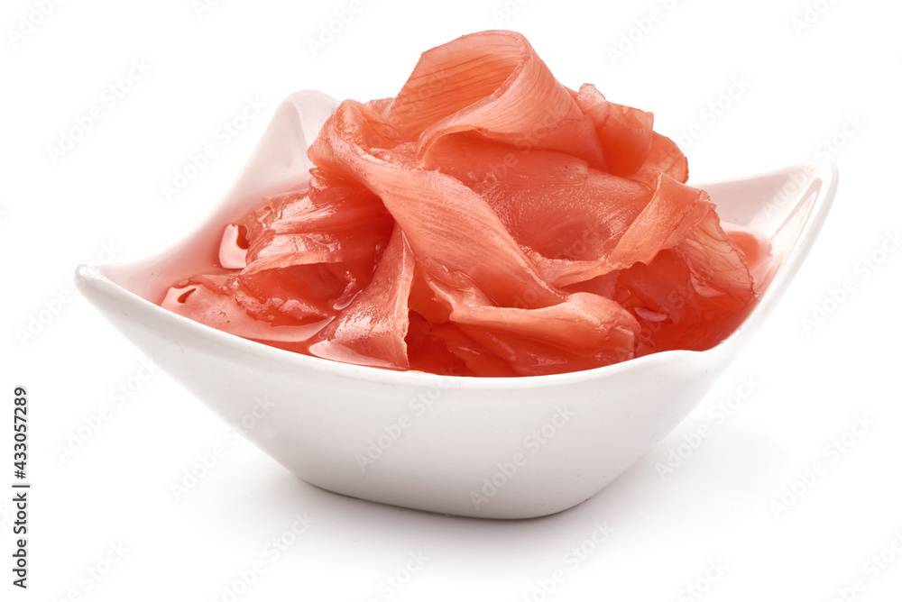 Marinated ginger slices, isolated on white background. High resolution image. Marinated ginger slices, isolated on white background. High resolution image.