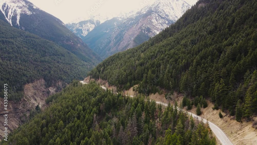Rising aerial drone shot of mountain road near Duffey Lake, British Columbia. Rising aerial drone shot of mountain road near Duffey Lake, British Columbia.