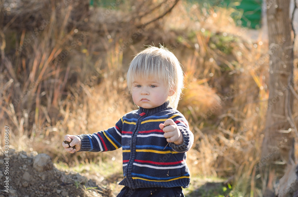 kid plays in the park with sand kid plays in the park with sand
