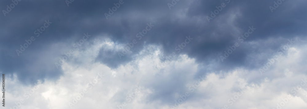 Obraz premium Dark clouds cover the sky. Dramatic stormy sky