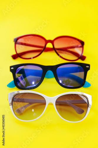 women's sunglasses in plastic frames with lenses