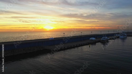 Yacht port and sea at sunset, beautiful landscape from above