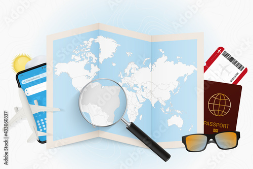 Travel destination Brazil, tourism mockup with travel equipment and world map with magnifying glass on a Brazil.