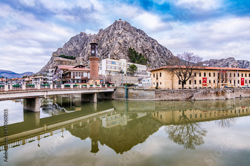 Old Ottoman houses evening panoramic view by the Yesilirmak River in Amasya City. Amasya is populer tourist destination in Turkey.