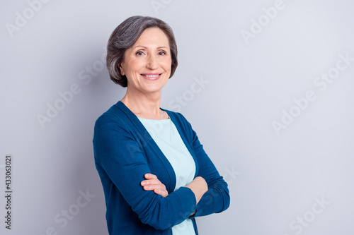 Konstfotografi Profile side portrait of attractive cheerful gray haired woman folded arms copy