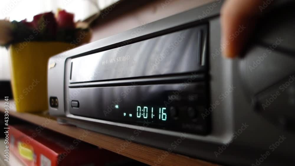rewinding tape on Video cassette recorder, VCR timer display rewinding tape on Video cassette recorder, VCR timer display