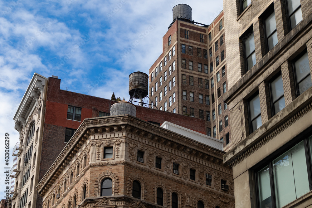 Beautiful Old Skyscrapers with Water Towers in the Flatiron District of New York City