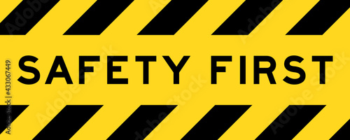 Yellow and black color with line striped label banner with word safety first