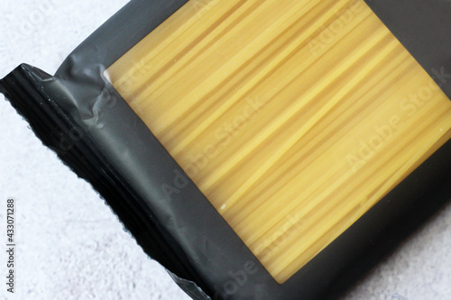 Dry spaghetti in a package photo