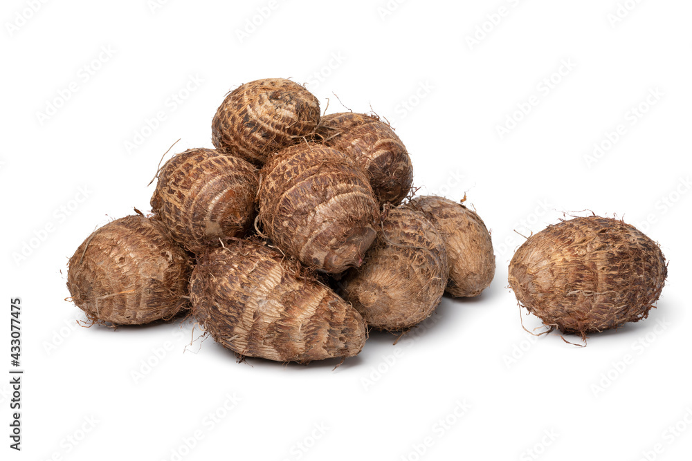 Heap of fresh whole taro vegetable isolated on white background Heap of fresh whole taro vegetable isolated on white background
