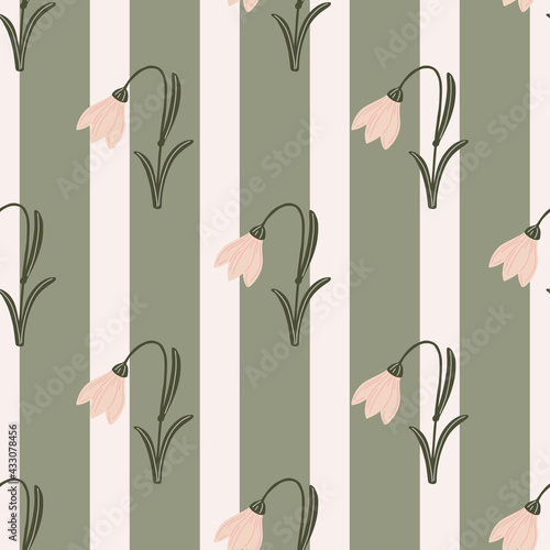 Bloom seamless nature pattern with pink colored bell flowers elements. Green striped background.