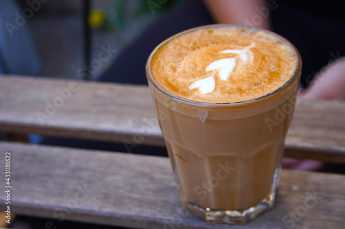 Coffee latte in a glass. Latteart!