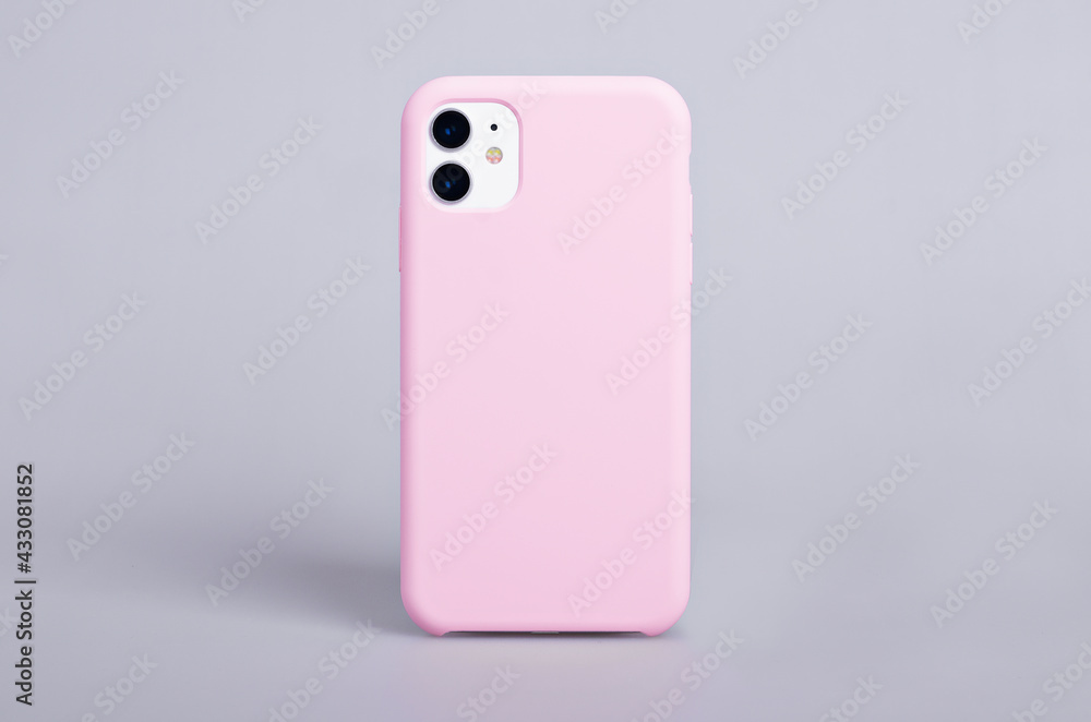 Foto Stock Pink phone case mockup. iPhone 11 mock up back view isolated on  gray background | Adobe Stock