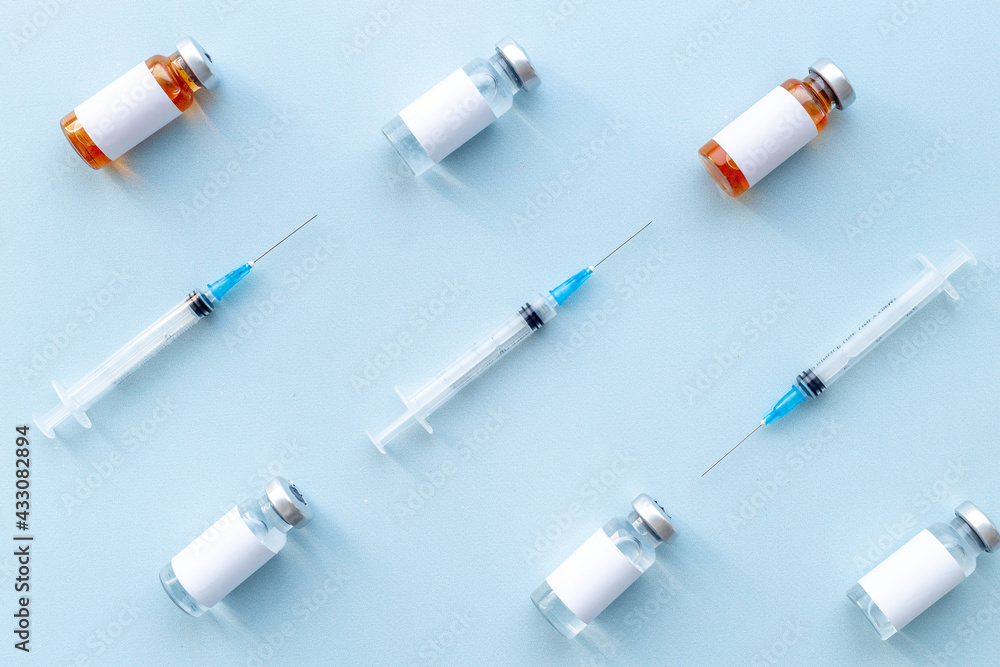 Medical vials with vaccine. Vaccination concept Medical vials with vaccine. Vaccination concept