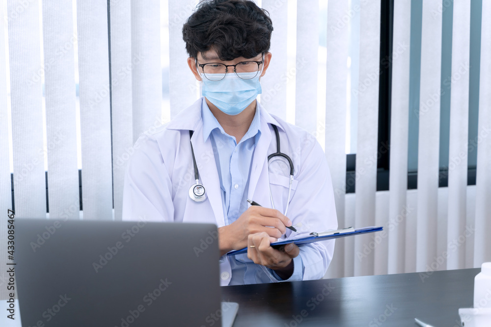 Doctor Wearing Medical Mask with hand sanitizer gel for hand hygiene corona virus protection healthcare worker Doctor Wearing Medical Mask with hand sanitizer gel for hand hygiene corona virus protection healthcare worker