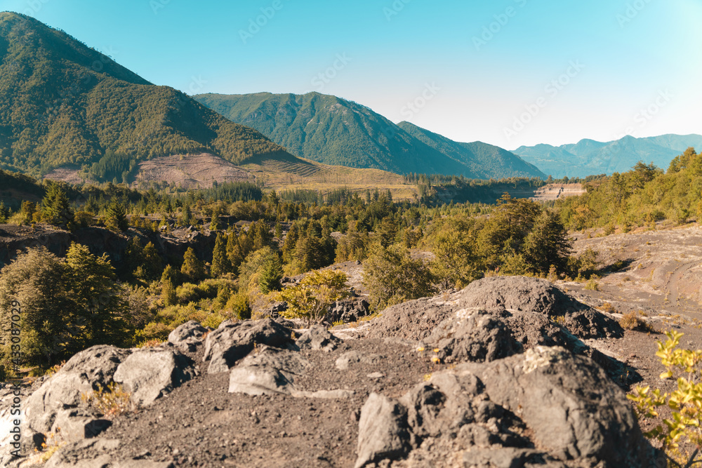 mountainous landscape with volcanic soil and forests