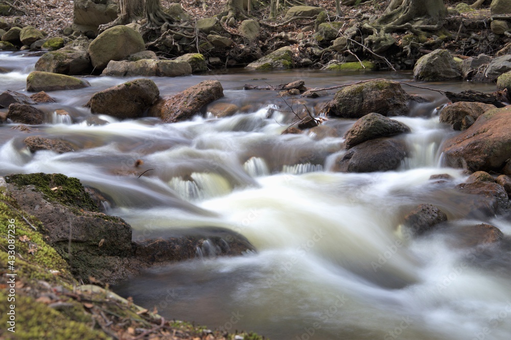 longtime exposure of the river Ilse in Ilsenburg in the Harz, Germany longtime exposure of the river Ilse in Ilsenburg in the Harz, Germany