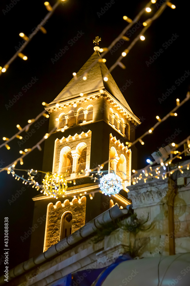 Obraz premium The night tower of the Lutheran Church of the Redeemer in the Christian Quarter, Old city East Jerusalem Israel. selective focus