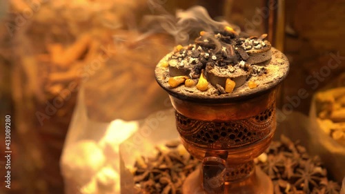 Gold Souk market. Dubai, UAE. Burning incense on coals