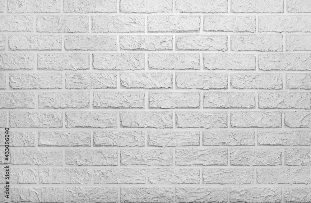 Obraz premium Brick wall. White brick wall background. Brick. Pattern of white tiles
