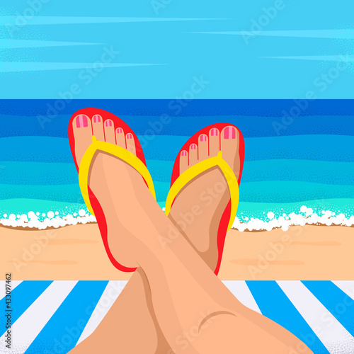 Legs of a young woman on the background of the ocean.