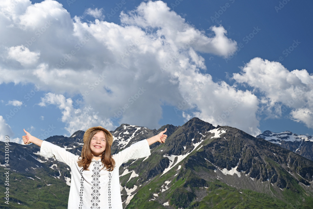 happy little girl with thumbs up on mountain happy little girl with thumbs up on mountain
