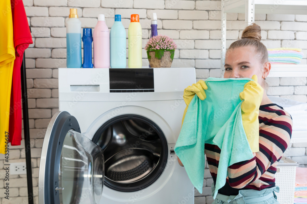 Young women doing chores. Young women doing housework and chores, she