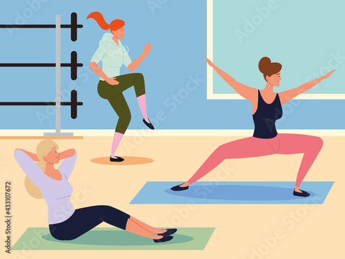 women stretching at gym