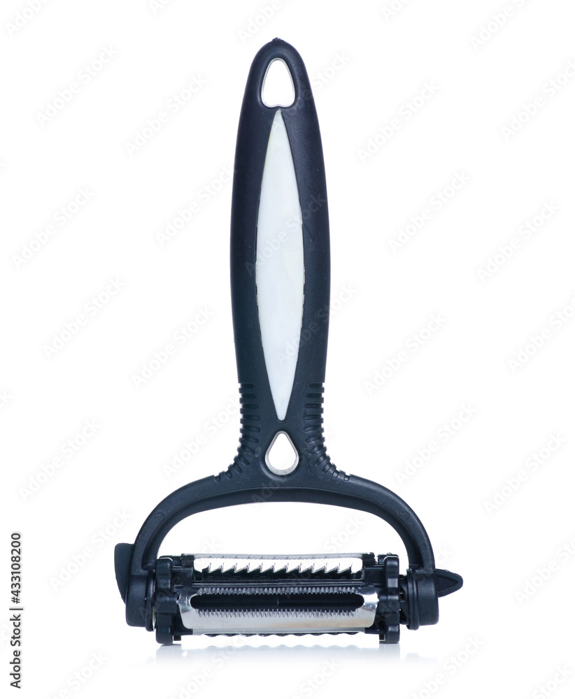 Vegetable cleaner peeler on white background isolation Vegetable cleaner peeler on white background isolation