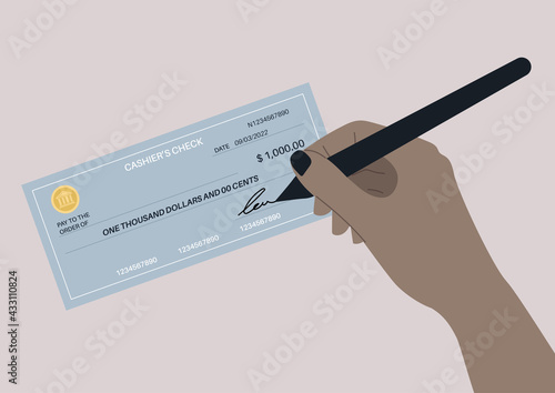 A hand signing a bank paper check, financial operations