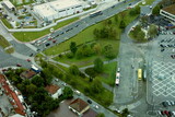 Bus and tram terminal next to a busy road in Sarajevo. Aerial view.