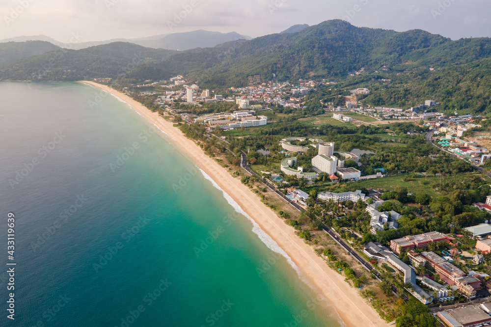 Aerial view of Karon Beach in Phuket. Beautiful scenery beach of Andaman sea. Famous tourist destination in Thailand