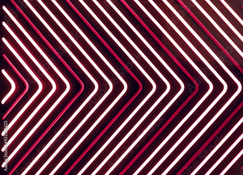 Abstract background of straight lines in neon color in the form of an arrow indicating the direction. 