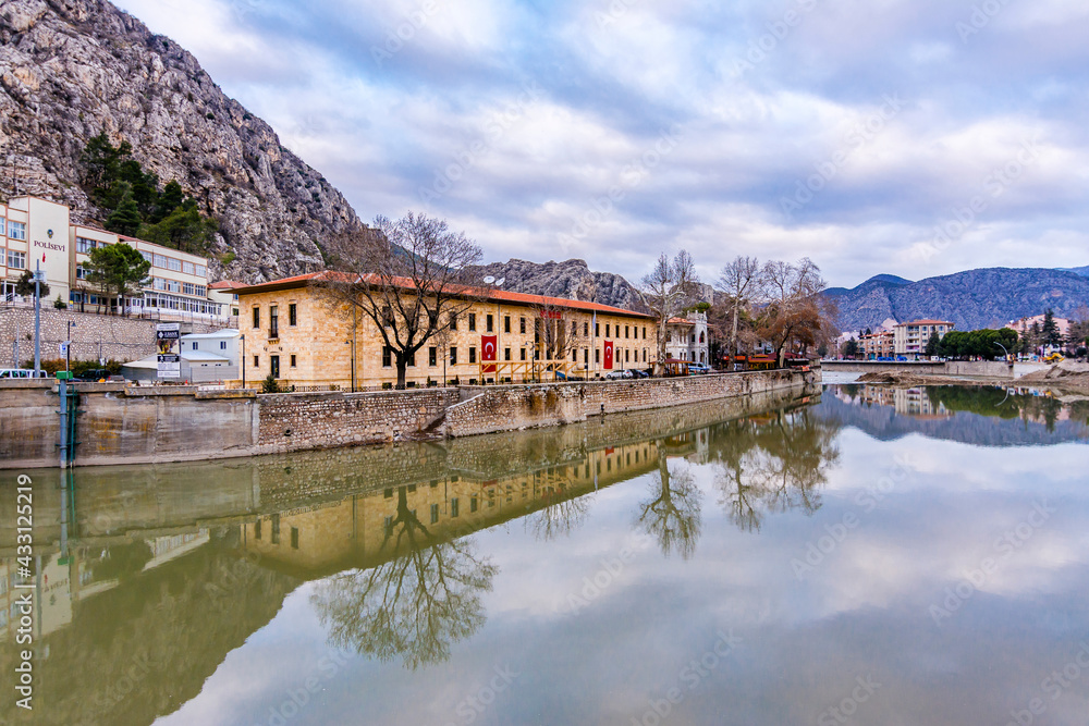 Old Ottoman houses panoramic view by the Yesilirmak River in Amasya City. Amasya is populer tourist destination in Turkey.