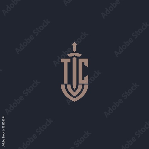TC logo monogram with sword and shield style design template