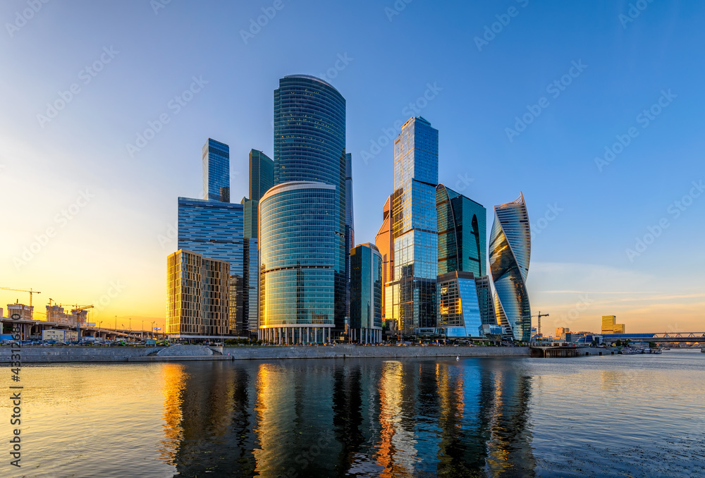 Skyscrapers of Moscow City business center and Moscow river in Moscow at sunset, Russia