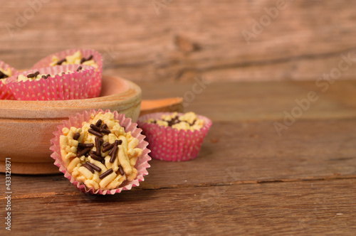 Malaysian homemade cookies called as Kuih Sarang Semua with chocolate rice served during Eid Fitri photo