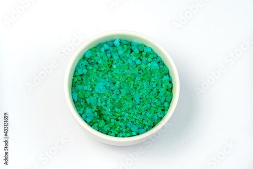 green mint sea bath salt in a white bowl