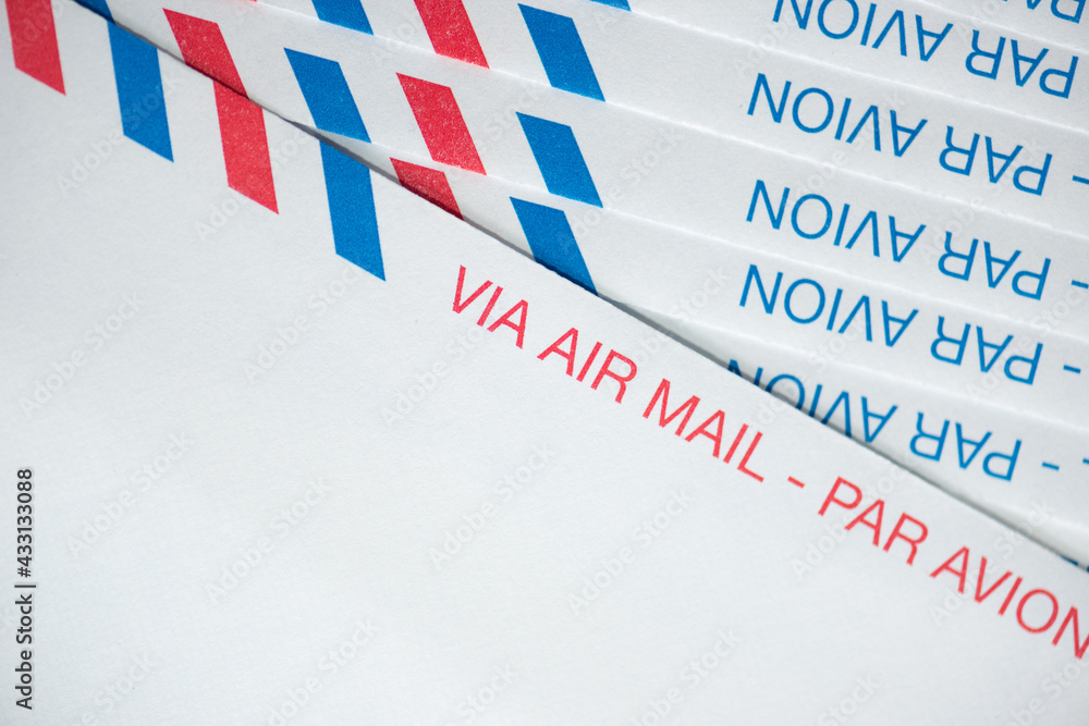 bilingual white blue and red air mail envelopes - macro lens (shallow depth of field) 