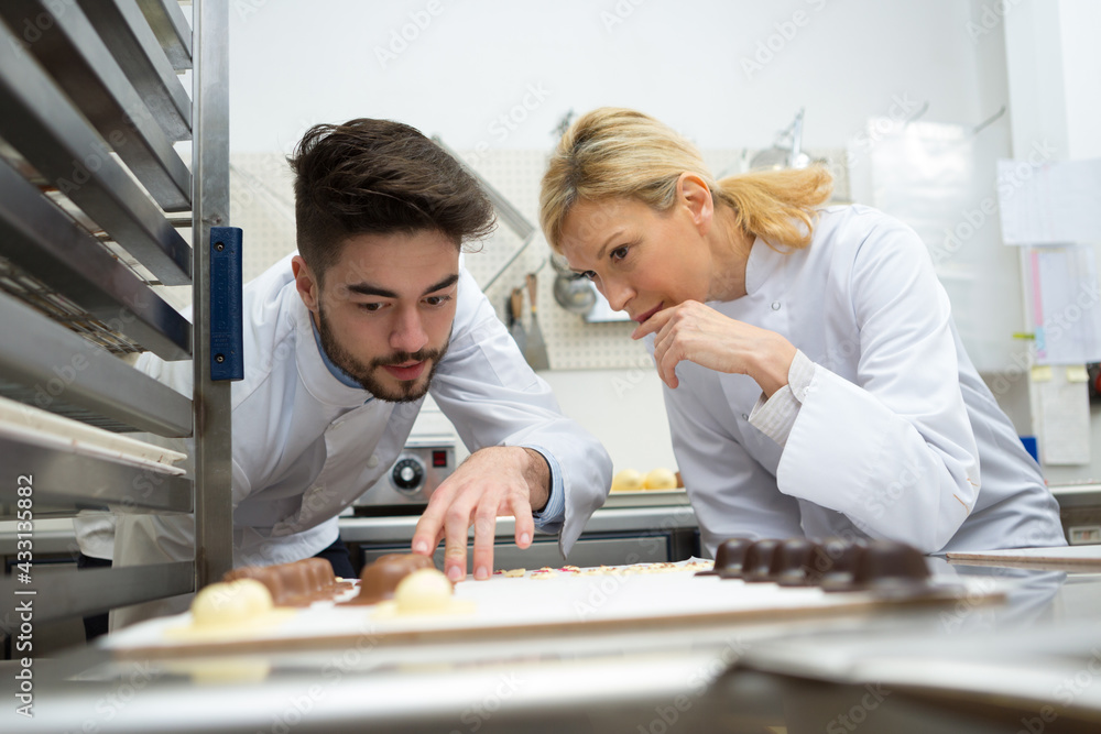 portrait of chocolate factory workers