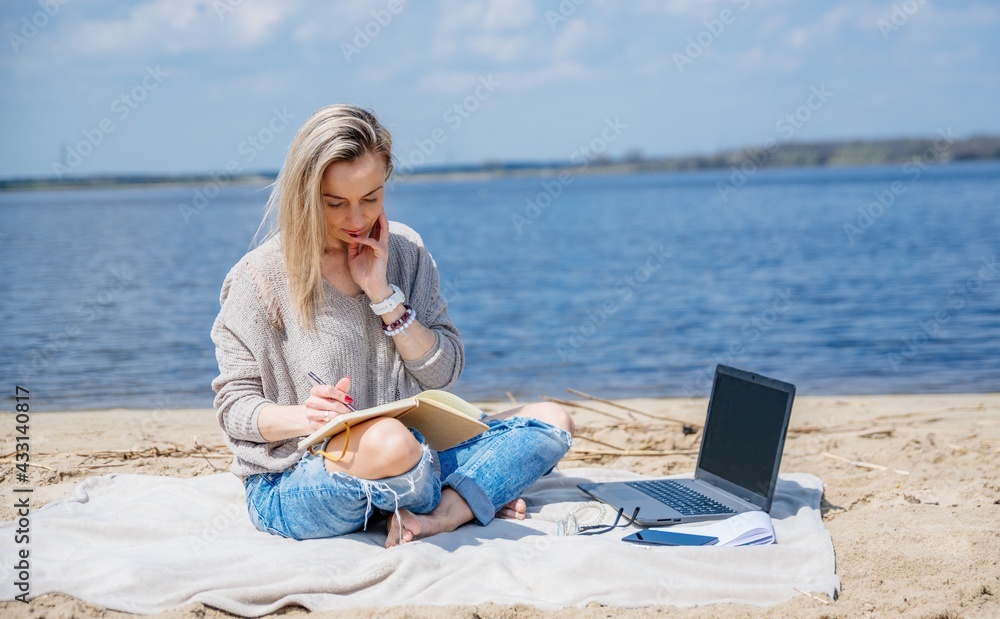 Freelance, work and travel concept. Smiling beauty blonde woman works remotely.