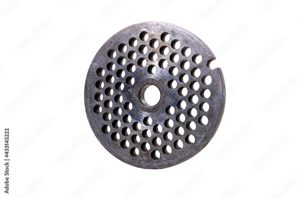 Metal strainer with holes used in meat grinders. Spare parts for the repair of appliances in the home kitchen. Metal strainer with holes used in meat grinders. Spare parts for the repair of appliances in the home kitchen.