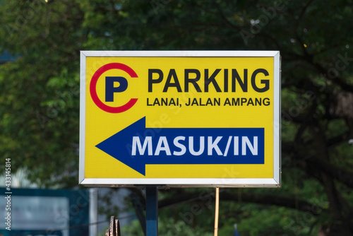 Colorful traffic and informational notices in Malaysian language