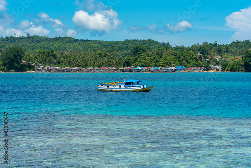 Islanders and tourists travel from island to island by slow boat in the Togian Islands. The ferry from Ampana connects the mainland with the main towns of Bomba to Wakai © ksl