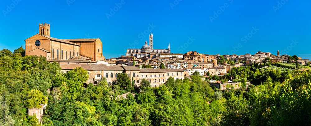 Fototapeta premium The Basilica of San Domenico and the Cathedral of Siena in Tuscany, Italy
