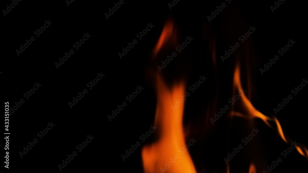 Fire or flames isolated on black background 4k resolution Fire is burning in the fireplace slow motion. Fire or flames isolated on black background 4k resolution Fire is burning in the fireplace slow motion.