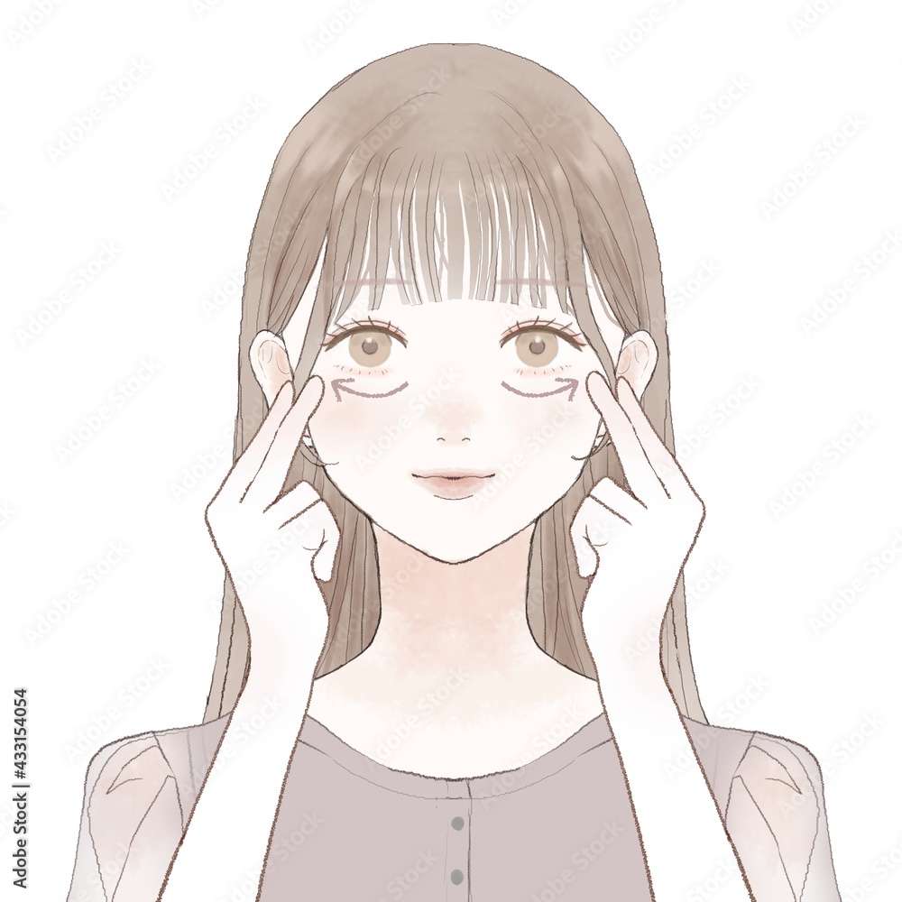 目の下をマッサージする女性