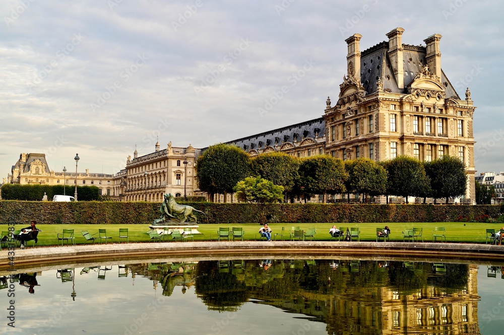 Pond in the Tuileries Gardens with the Palace of the Louvre Museum